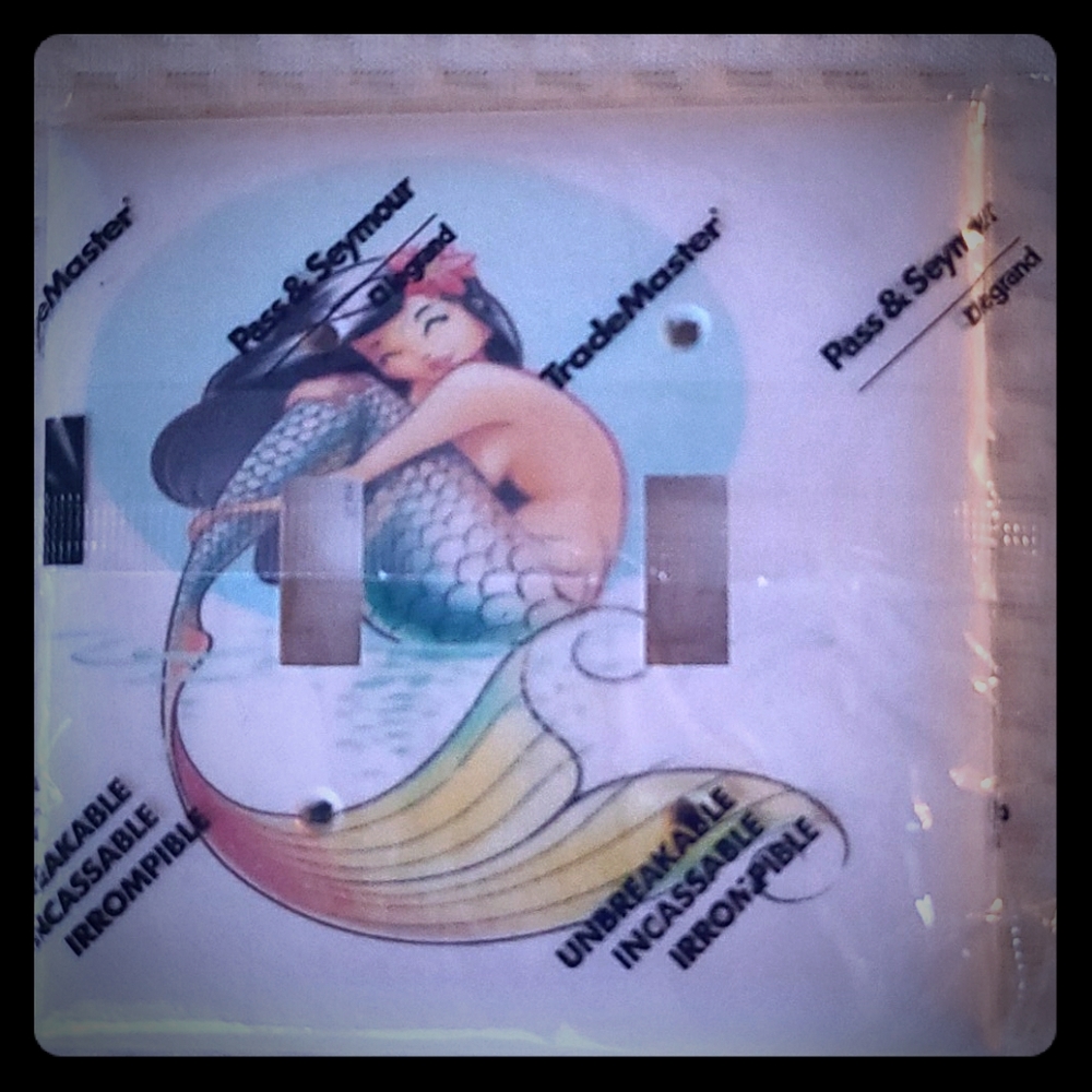 New in package-Mermaid light switch cover